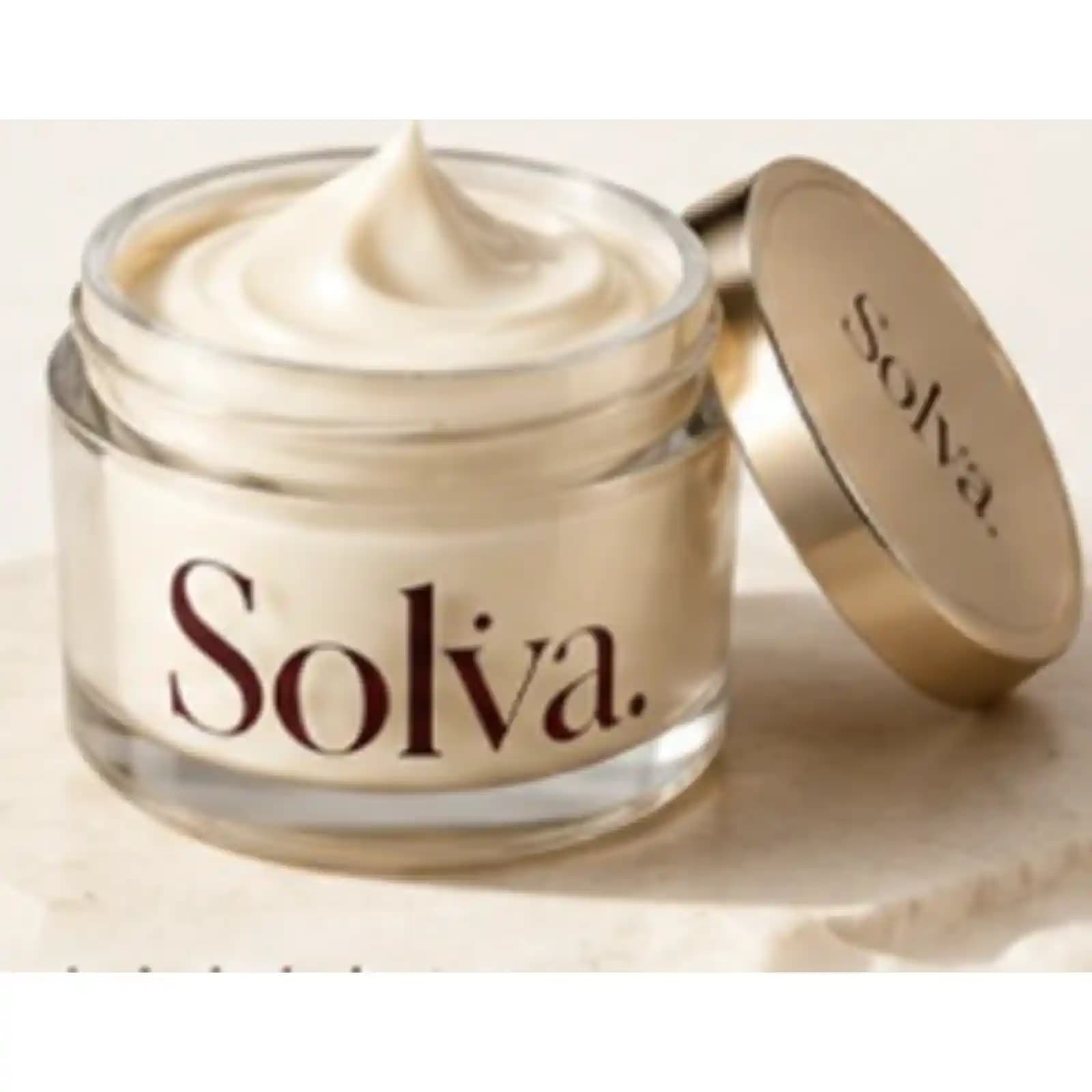 Open Solva jar showing rich ivory cosmetic cream